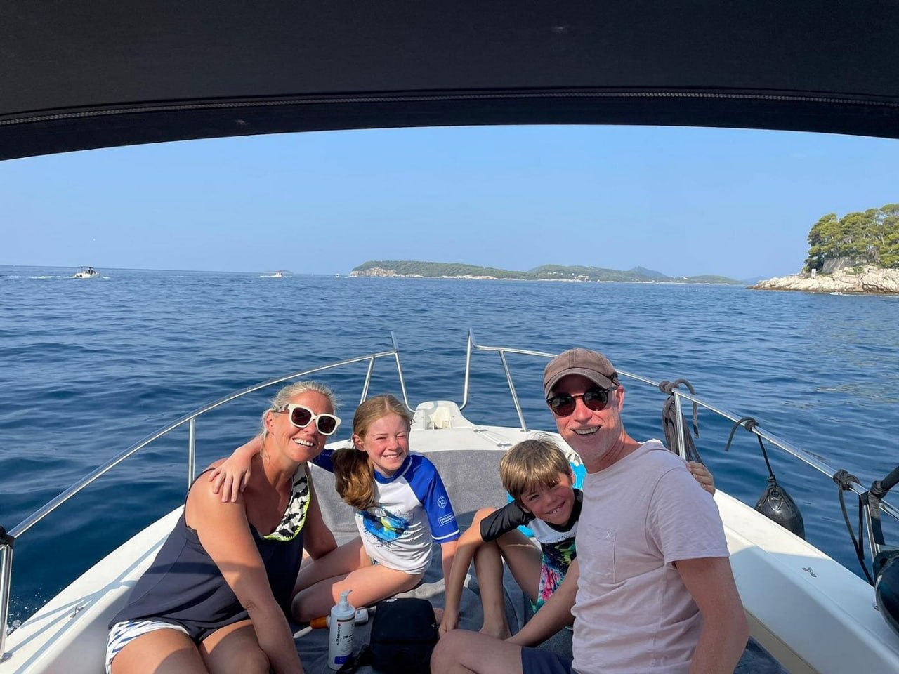 Family on a private White Shark speedboat among the Elaphiti Islands near Dubrovnik