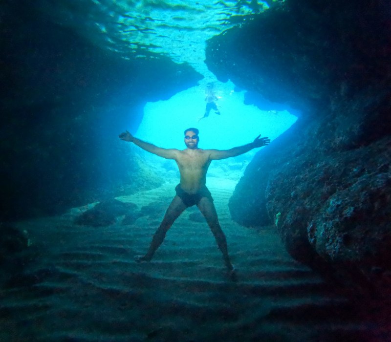 Snorkeler in the glowing Blue Cave near Dubrovnik