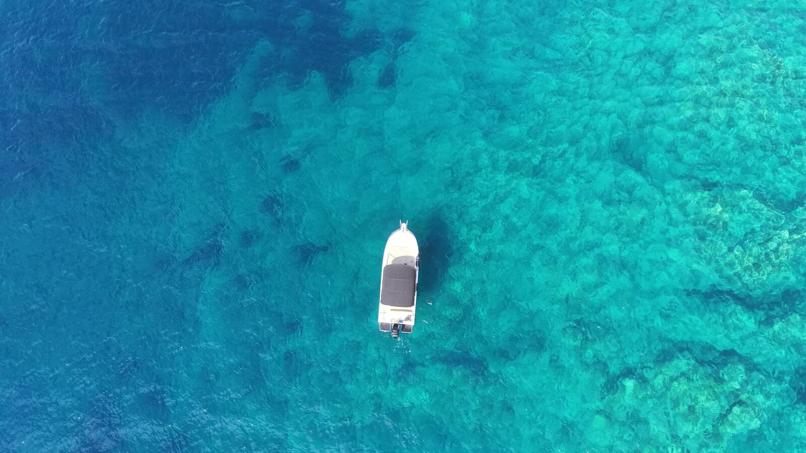 Private boat on the crystal-clear turquoise Adriatic near Dubrovnik