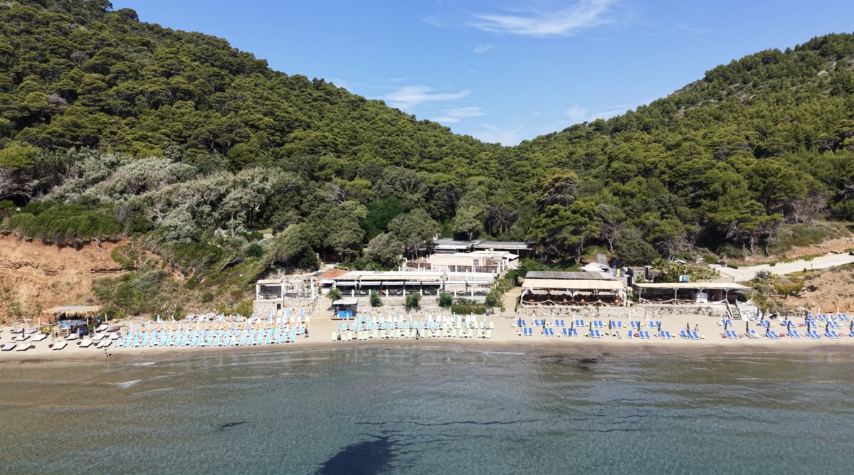 Aerial view of Šunj sandy beach on Lopud with turquoise shallow water